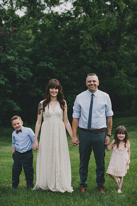 bride and groom with kids