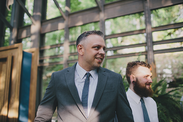 groom waiting at the altar