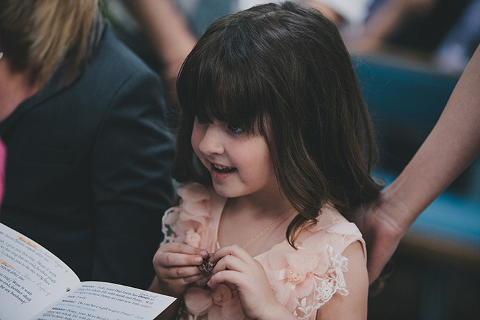 bride's daughter participating in ceremony