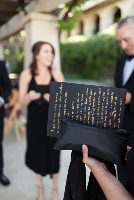 wedding vows written in gold on black