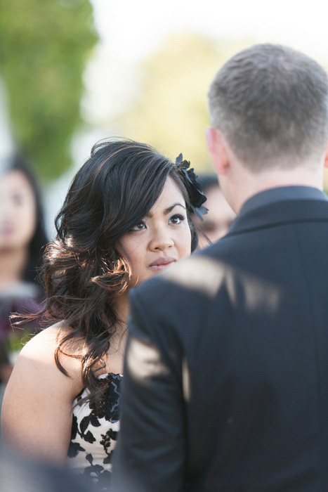 bride looking at groom during ceremony