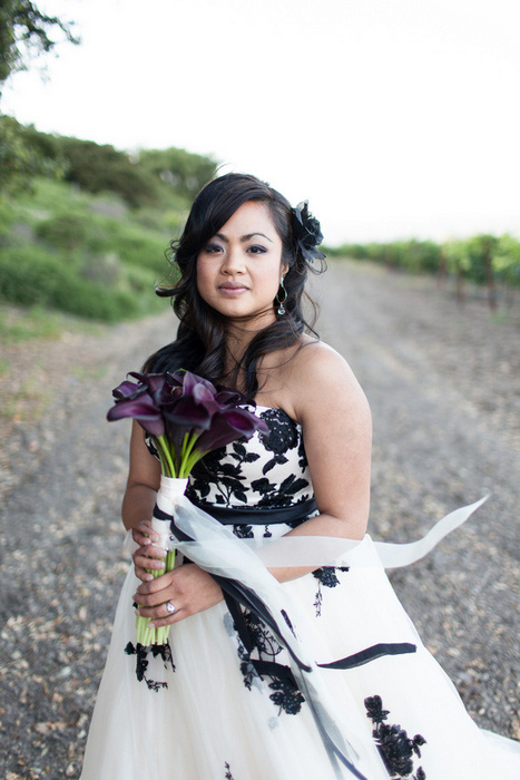 bride in black and white dress