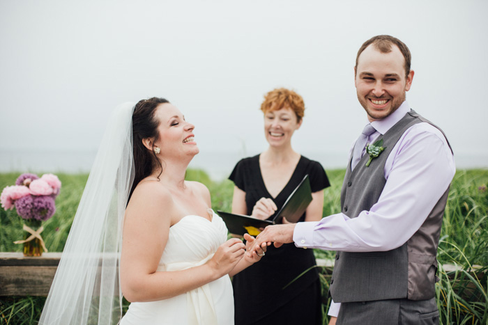 bride laughing during ceremony