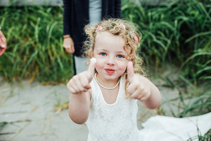 flower girl giving thumbs up