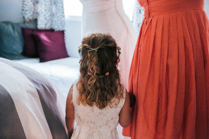 bride's daughter watching her mom