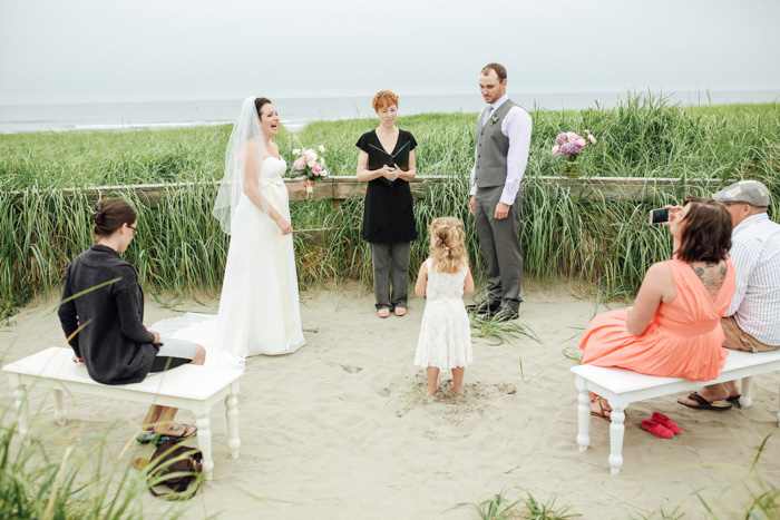 flower girl at beach ceremony