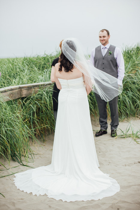 bride at beach altar