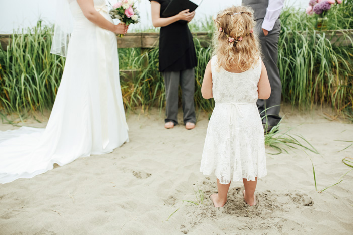 flower girl at beach ceremony