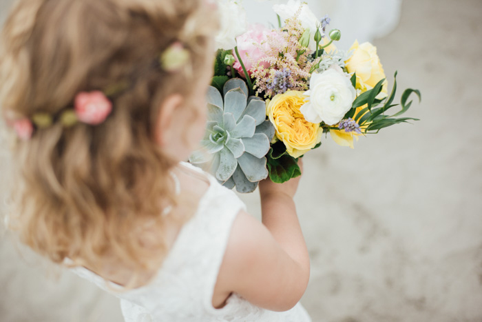flower girl holding bouquet