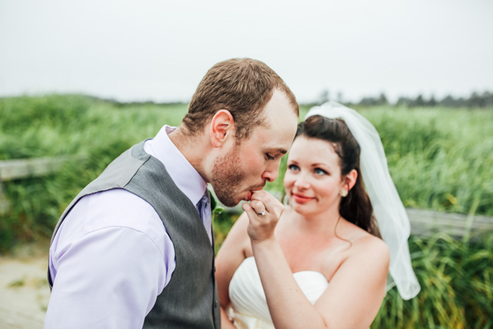 bride feeding groom cake