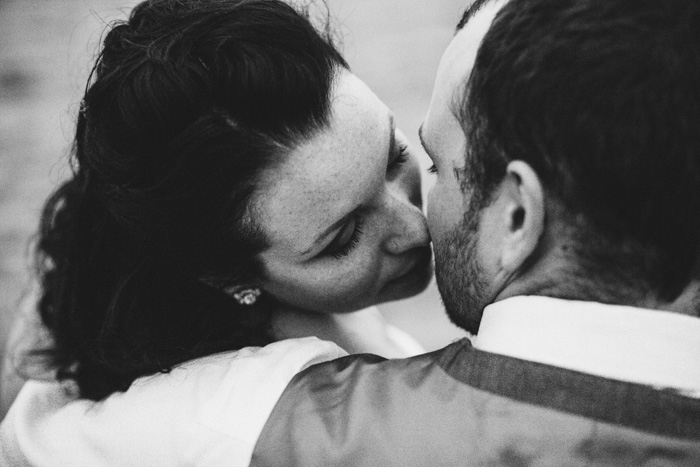 bride and groom kissing