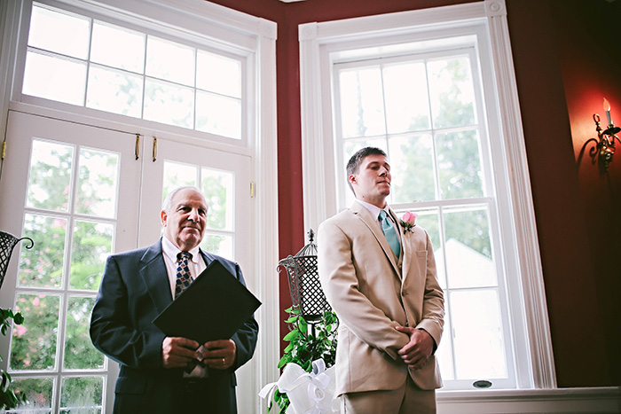 groom waiting at the altar