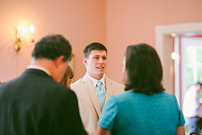 groom talking to guests