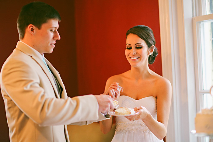 bride and groom eating cake