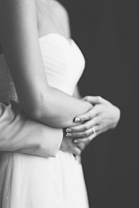 bride and groom embracing