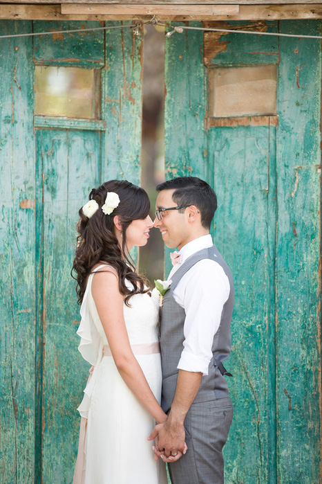 wedding portrait with bride and groom  facing each other