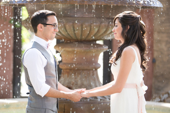 bride and groom exchanging vows