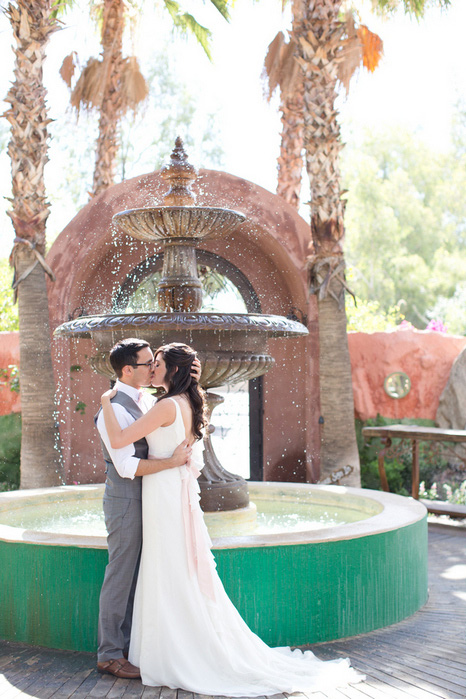 bride and groom first kiss