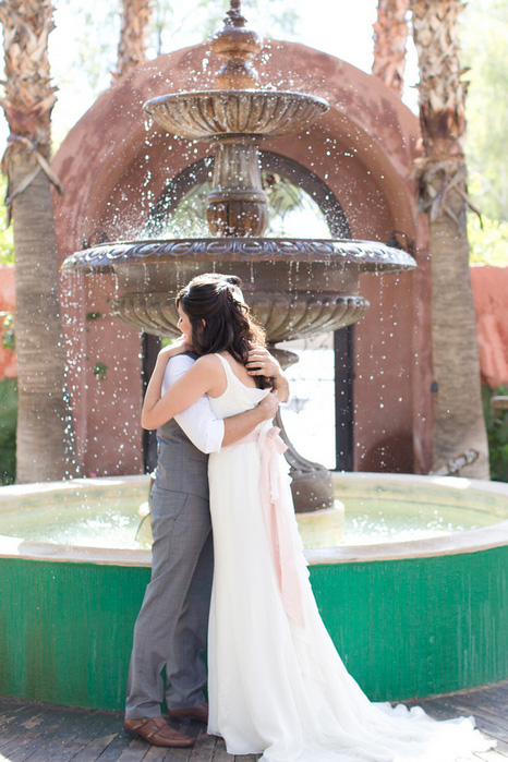 bride and groom hugging