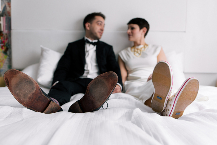 bride and groom in bed