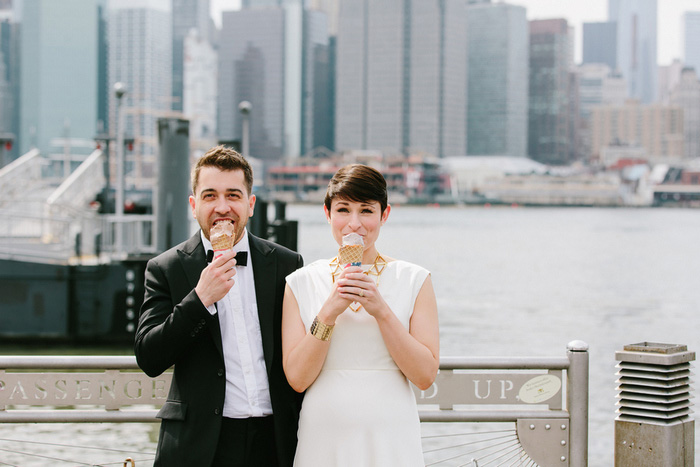 bride and groom eating ice cream