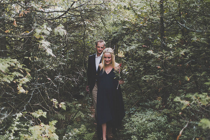 bride and groom in the woods