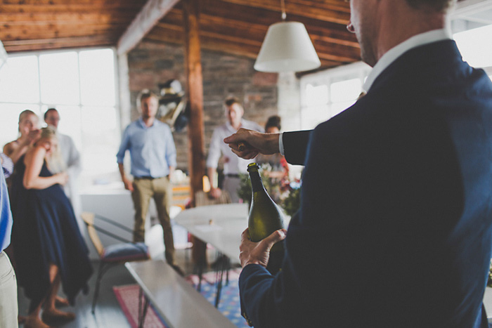 popping a bottle of champagne