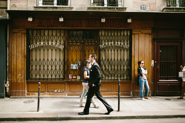 groom walking through Paris