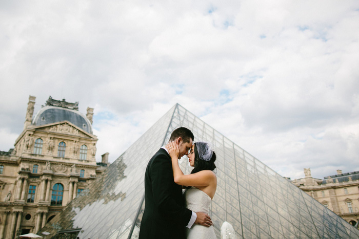 bride and groom portrait in front of Louvre