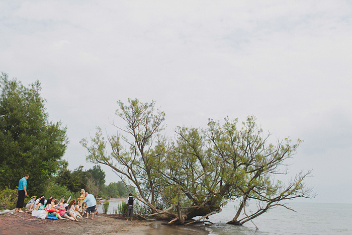 guests at beach wedding ceremony