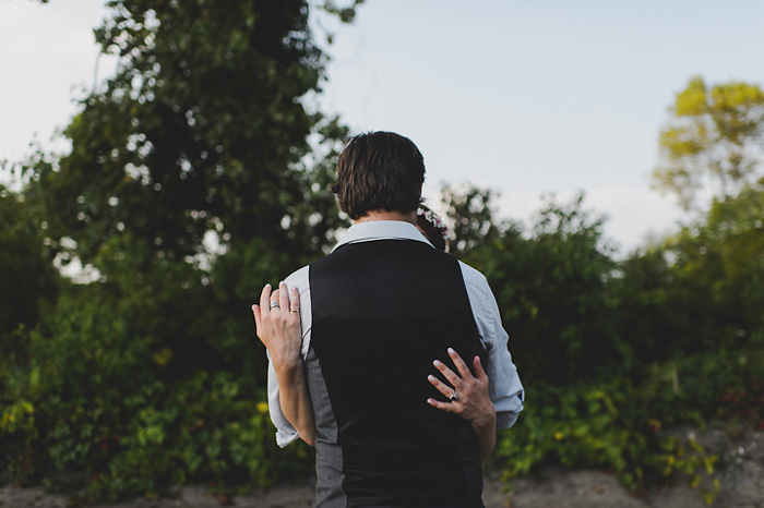 bride and groom embracing