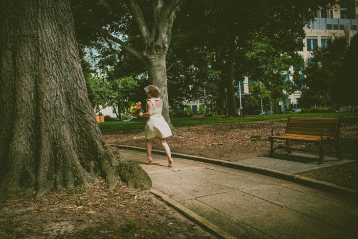 bride walking through raleigh park