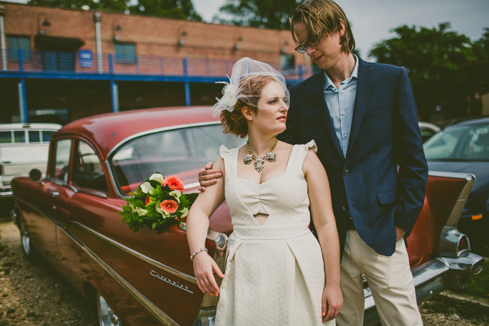 wedding portrait in front of car