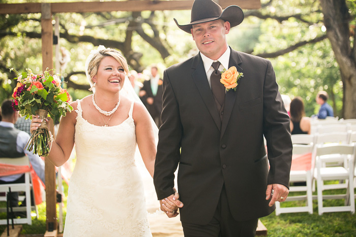 bride and groom walking down the aisle