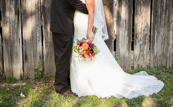 bride and groom embracing