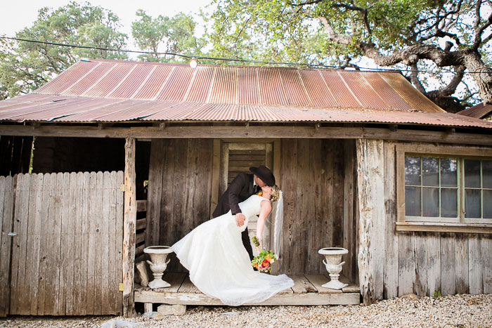 groom dipping bride