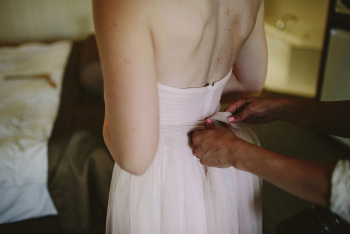 bride getting dressed