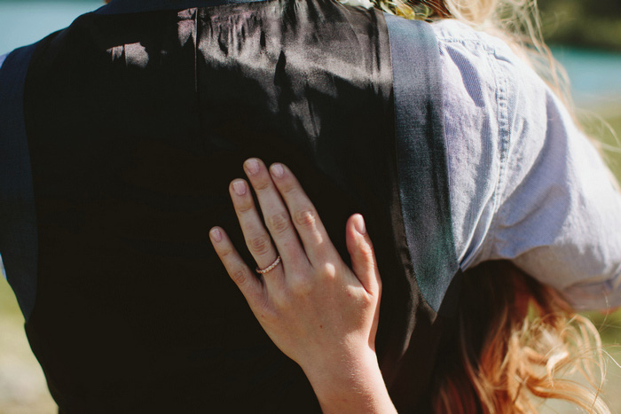 bride and groom hugging