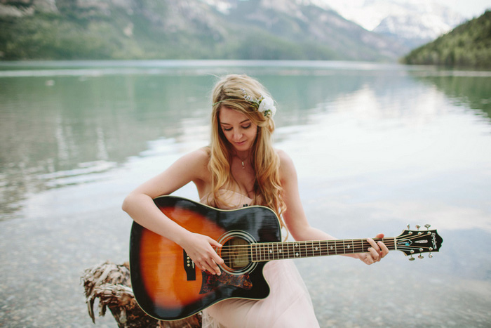 bride playing guitar