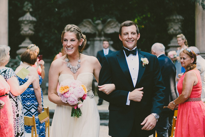 bride and groom walking down aisle