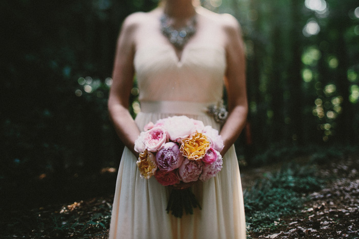 purple, pink, and yellow rose bouquet