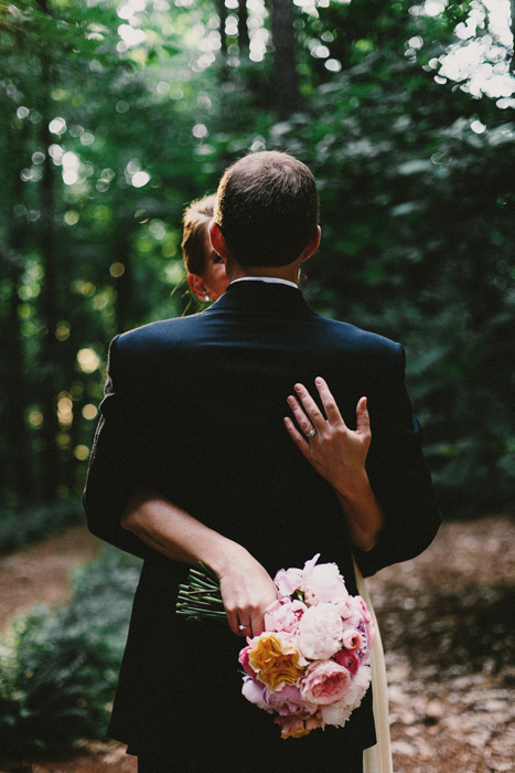 bride and groom embracing