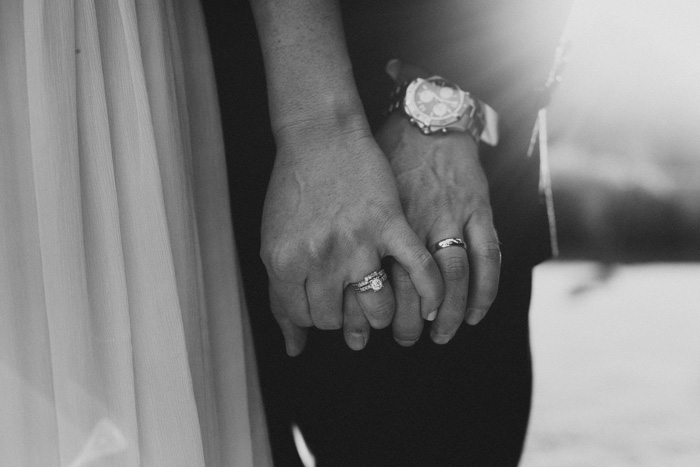 close-up of bride and groom hands