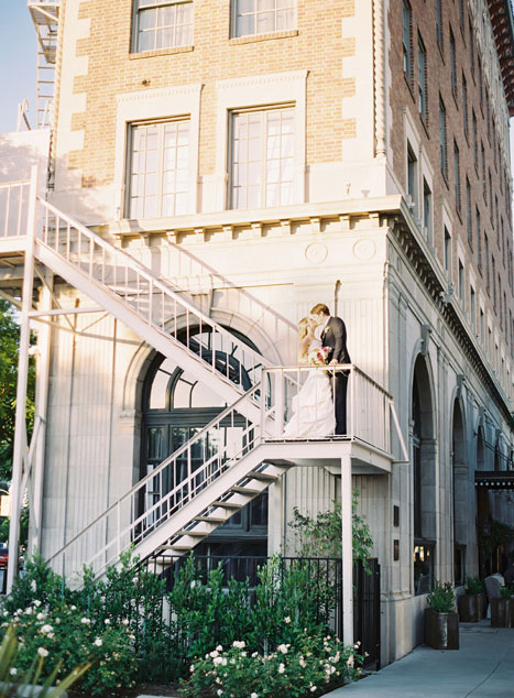 bride and groom on fire escape