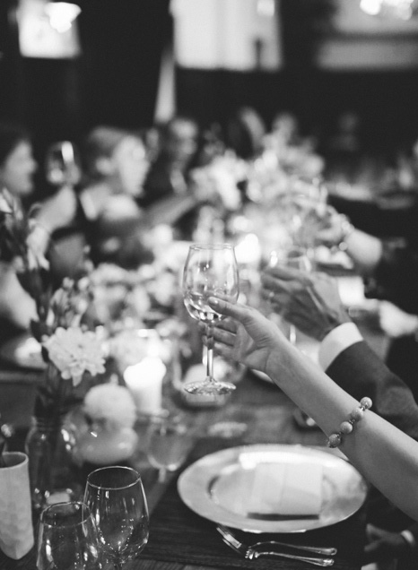 guests raising glasses