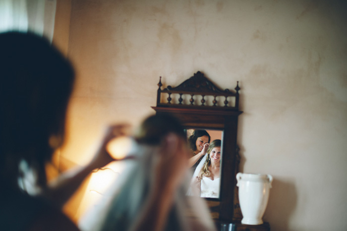 bride's refelction in mirror