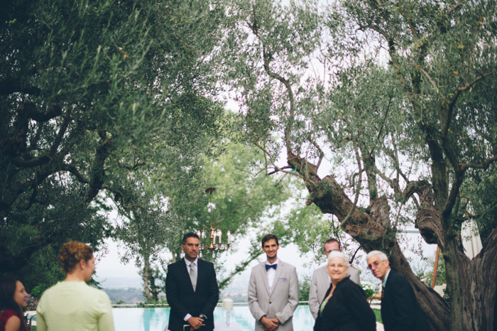 groom waiting at the altar