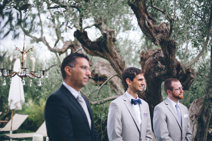 groom waiting at the altar