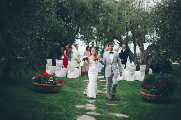 bride and groom walking down the aisle