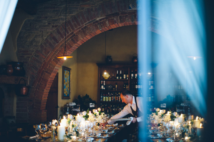 waiter setting wedding table